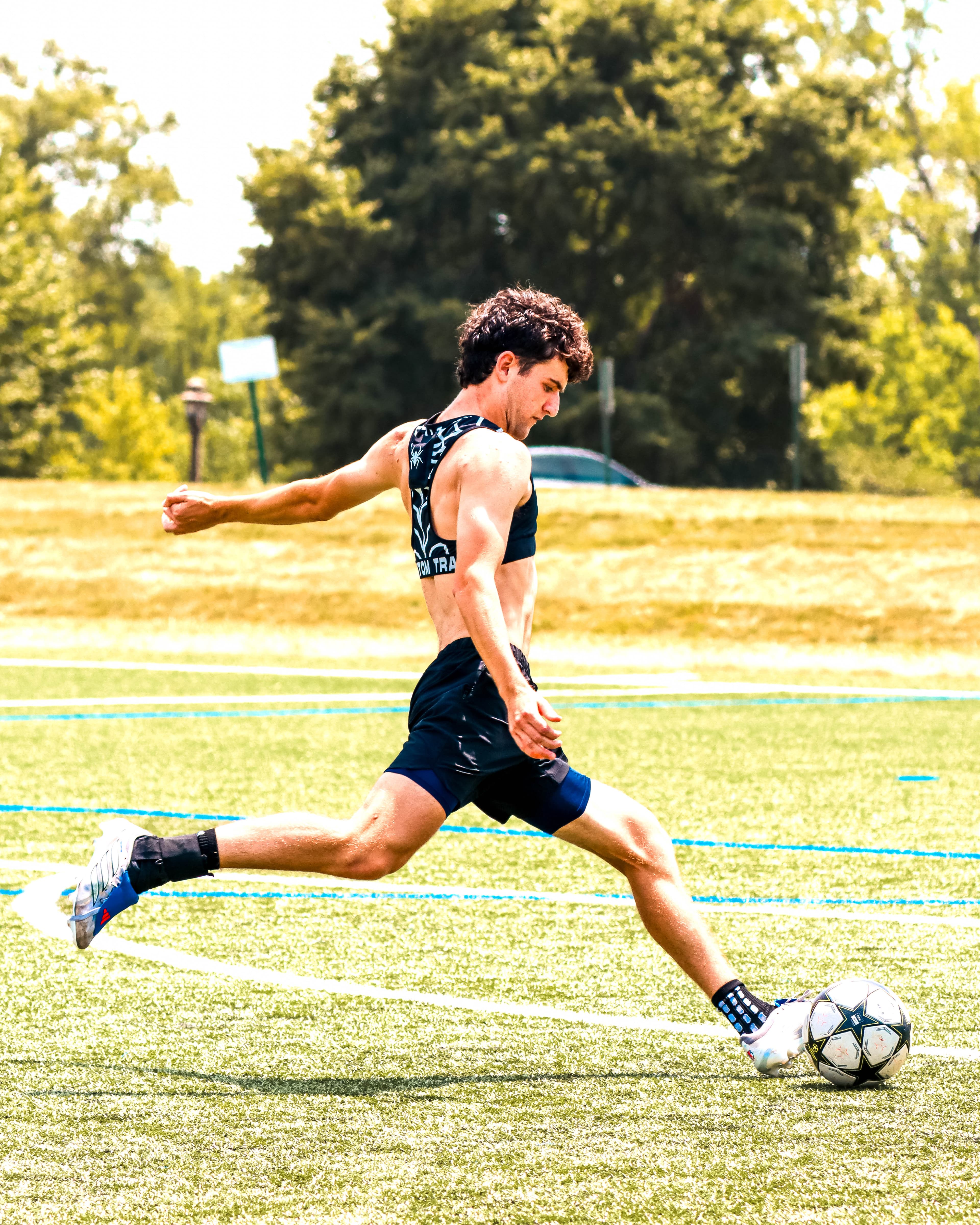 Athlete striking the ball in the Phantom Vest