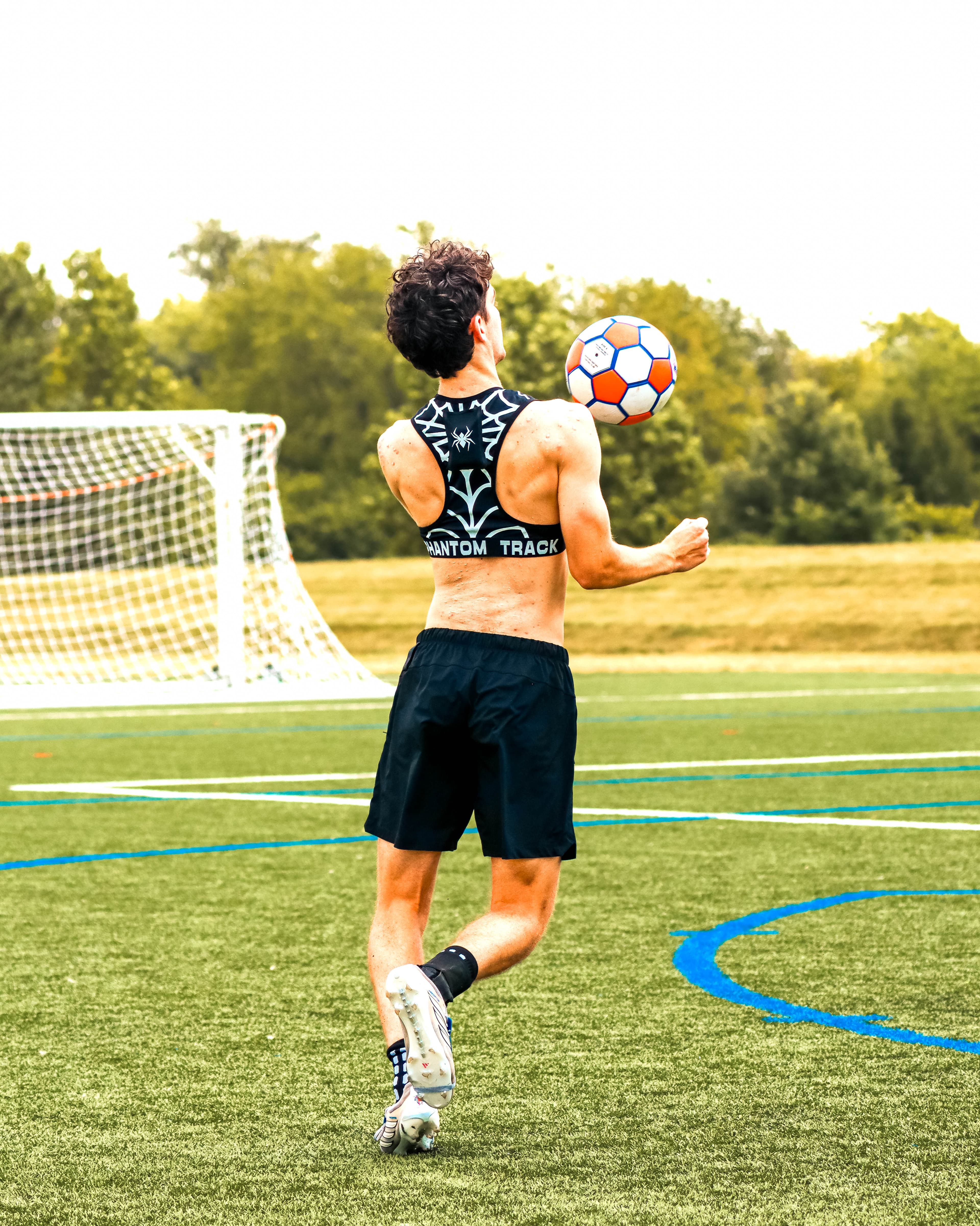Back view of the Phantom Vest during a juggle