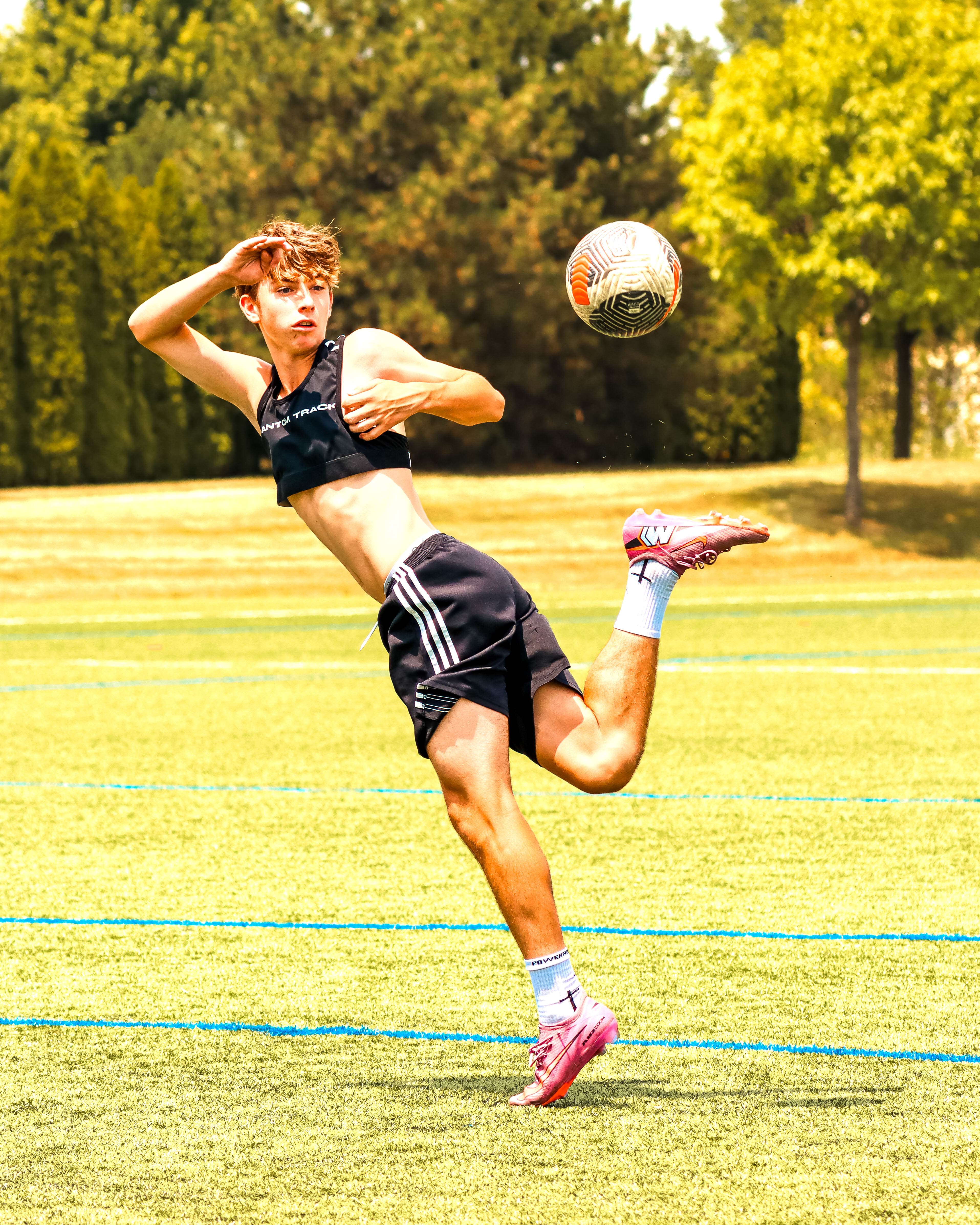 Side bicycle kick wearing the Phantom Vest